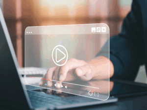 stock image of someone watching video on laptop