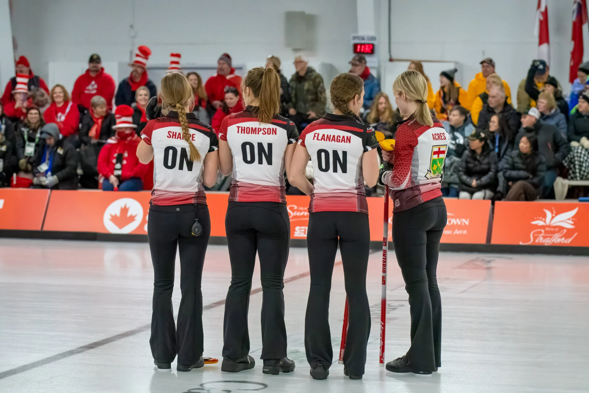 022323_MikeSchut072-2048x1366 Young Ontario athletes on the ice standing together.